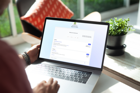 School administrator viewing enquiries and conversion progress in a dashboard.